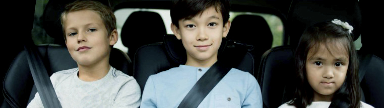 Children wearing seat belts